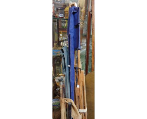 A vintage Winsor and Newton folding artist's easel - sold with two fishing rods in canvas cases