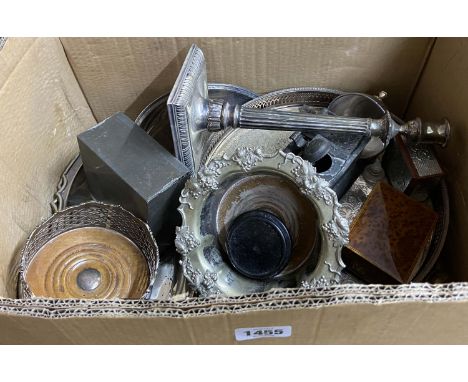 A box containing a quantity of silver plated items including wine coasters and candlestick, etc.