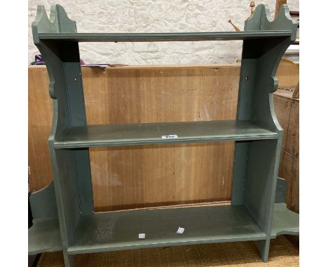 An 80cm later painted wood wall mounted three shelf unit with flanking vases stands
