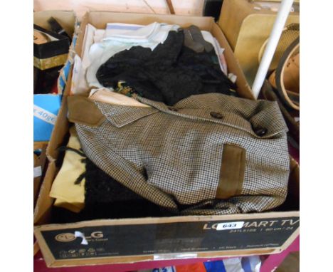 A box containing a quantity of textiles including damask and other tablecloths, tweed child's coat, etc.