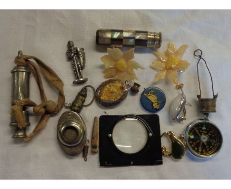 A bag containing a small quantity of collectable items including Aldershot Store silver plated whistle, travelling compass, e