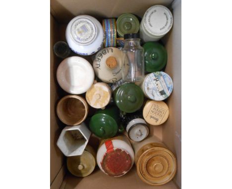 A box containing a selection of ceramic and other storage jars