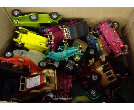 A small collection of die cast vintage cars, mostly Matchbox Models of Yesteryear