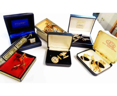 A selection of boxed vintage and modern cuff-links and tie pin sets