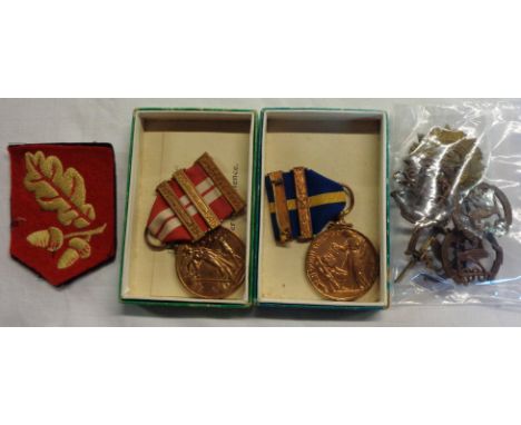 A World War II Irish Emergency Medal with two 1939-1946 bars and original ribbon, also an acorn and oak leaf patch - sold wit