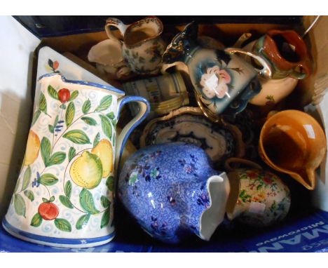A box containing assorted ceramic items including blue and white sauce tureen and stand, cheese dish, etc.