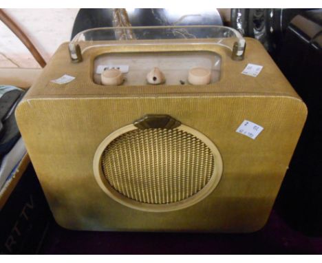 A vintage Ever Ready Sky Queen portable valve radio with faux snakeskin case and perspex handle