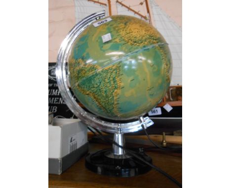 A vintage light up globe