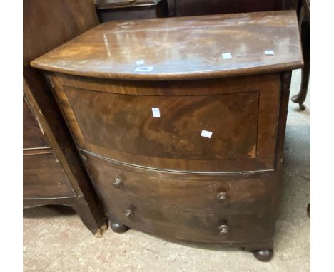 A 65cm 19th Century mahogany bow front commode carcass with lift-top and dummy drawer fronts under, set on pommel feet