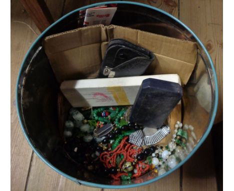 A tin containing a quantity of assorted collectable items including enamel medals, costume jewellery, watches, etc.