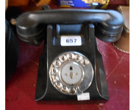 A vintage black Bakelite telephone