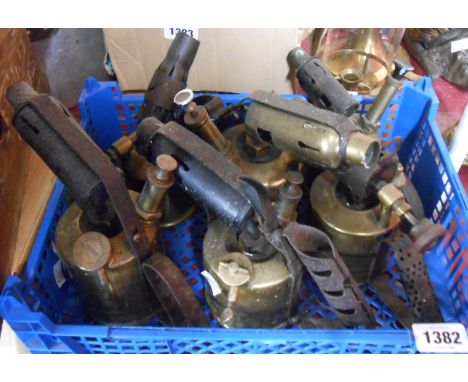 Six vintage brass and metal blow lamps