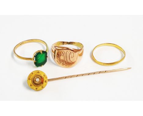 Various scrap gold rings and a stick pin, some 9ct.