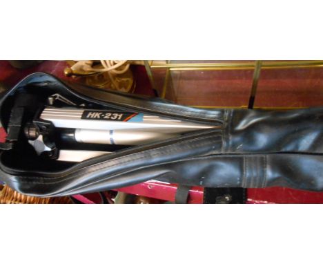 A camera tripod in soft case