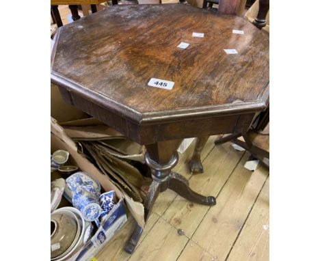 A Victorian rosewood trumpet work table with sewing contents, set on faceted tapered pillar and tripod base