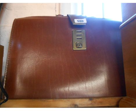 A vintage leather satchel style briefcase