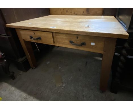 A 91cm vintage oak low table with two frieze drawers, set on square legs and casters