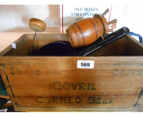 An old wooden packing case for Bovril Corned Beef containing a small quantity of collectable items including pull-along woode
