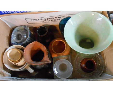 A box of containing a selection of ceramic items and glassware