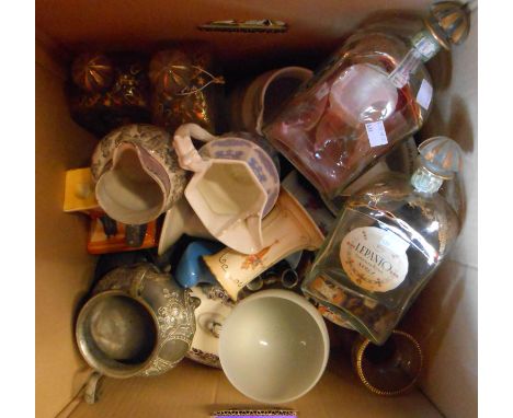 A box containing assorted ceramic and other collectable items including jugs, decanters, silver plated ware, etc.