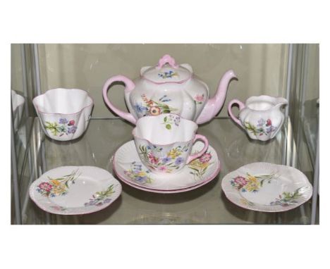 Shelley Wild Flowers pattern tea for one comprising: teapot with stand, cup, saucer, cream jug and sugar basin Condition: All