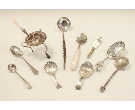 Various silver and white metal items including; Dutch caddy spoon, Georgian teaspoon, two other caddy spoons, toddy ladle etc