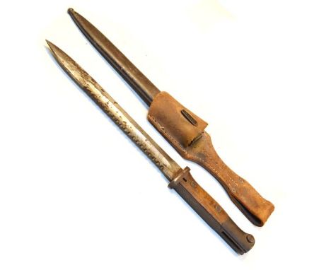 Militaria - World War I Imperial German S84/98 bayonet by Heller of Marienthal, having a saw back blade and with a wooden gri