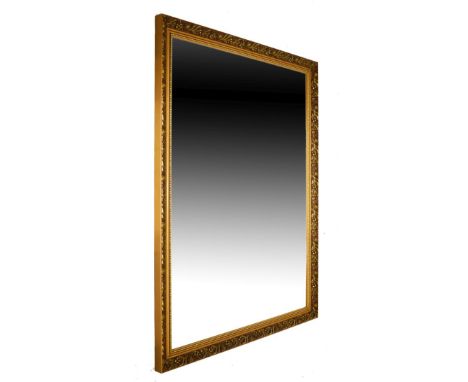 Gilt framed over mantel mirror with bevelled rectangular plate, 121cm x 89cm   Condition: 