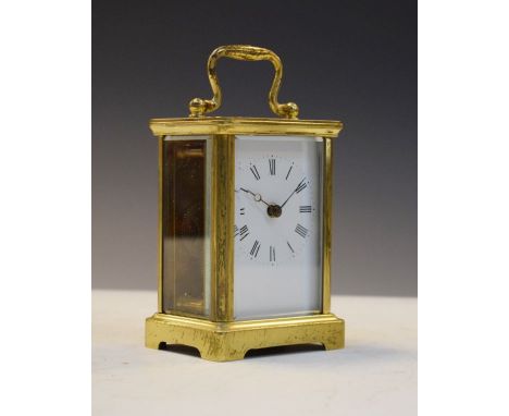 Brass cased carriage clock, the white enamel dial with Roman numerals   Condition: 