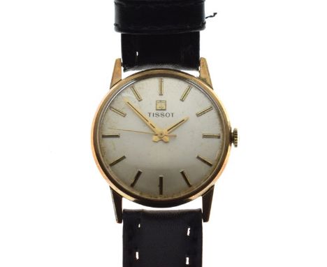 Gentleman's 9ct gold cased Tissot dress watch, the champagne dial having centre seconds and baton markers, on a leather strap