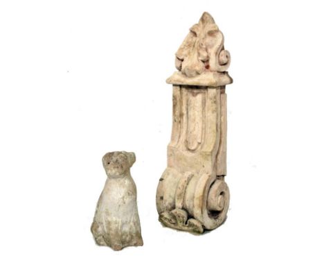 Composition bracket of scroll design, 65cm high, together with a model of a seated dog (2)   Condition: 