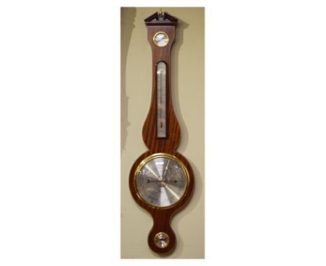 Reproduction inlaid mahogany cased wheel barometer and thermometer by Comitti of Holborn   Condition: 