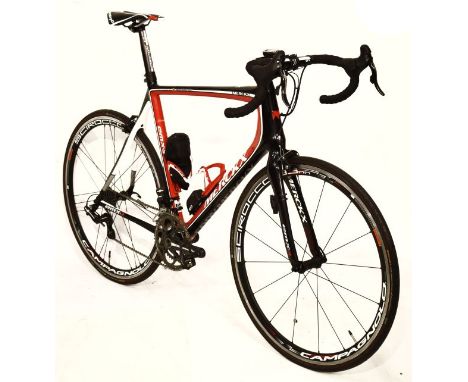 Eddie Merckx carbon fibre framed racing cycle, the centre bottom bracket to top of seat clamp measuring 61cm, fitted Campagno