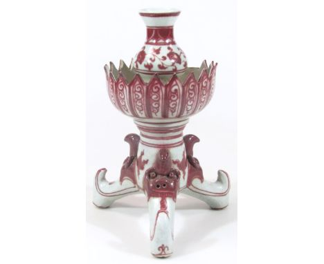 A 20thC Chinese Ming style pottery centrepiece, with floral dish holder and vase centre on tripod base, decorated with flower