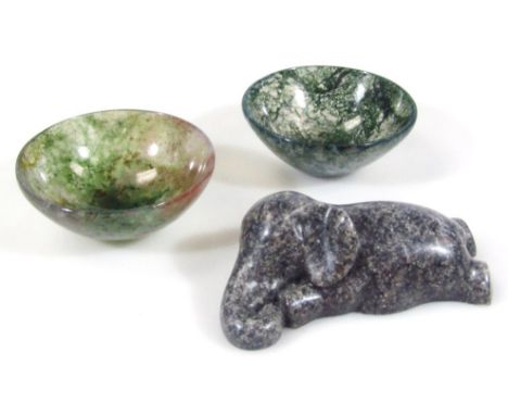 A jade style bowl, of circular outline, 7cm dia., and a polished elephant figure. (3)