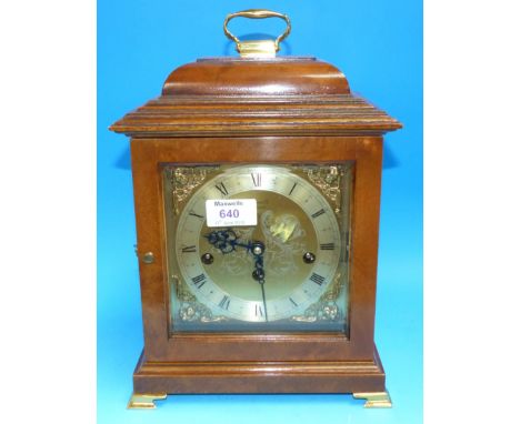 A reproduction walnut cased dome top bracket clock with brass dial, silvered chapter ring, movement chiming on gong, by Conit