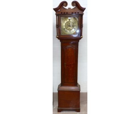 An 18th century oak longcase clock with boxwood and ebony line inlay, the hood with swan neck pediment and turned side column