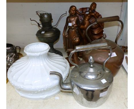 A copper kettle; a chromed similar; an oil lamp; 2 plaster figures