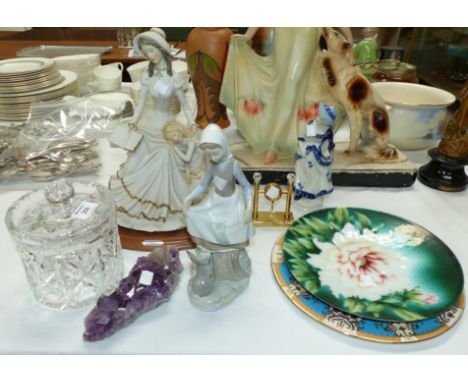 A Lladro group:  girl with rabbit; 2 decorative figures; 2 plates; a gilt and crystal clock; a biscuit barrel