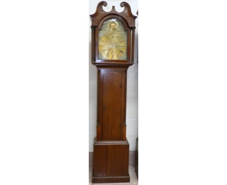 An 18th century longcase clock, the hood with ball and spire brass finials, swan neck pediment and brass mounted side pillars