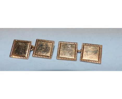 A pair of continental yellow metal cufflinks, stamped '18K'