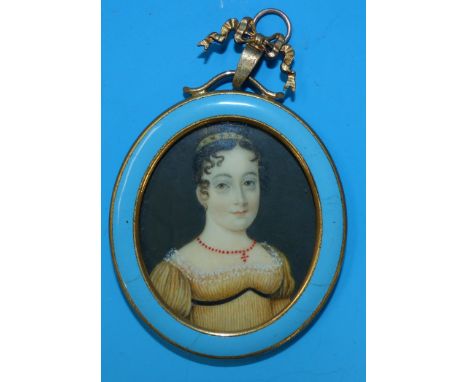 A 19th century portrait miniature of a woman in Regency dress, enamelled frame