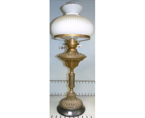 A Victorian style brass oil lamp with ribbed white glass mushroom shade, 27"