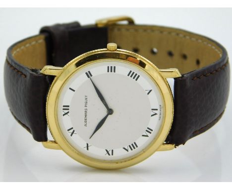 An 18ct gold cased Audemars Piguet Ultra Thin model 2003/1 gents wristwatch, working order, case diameter 32.5mm