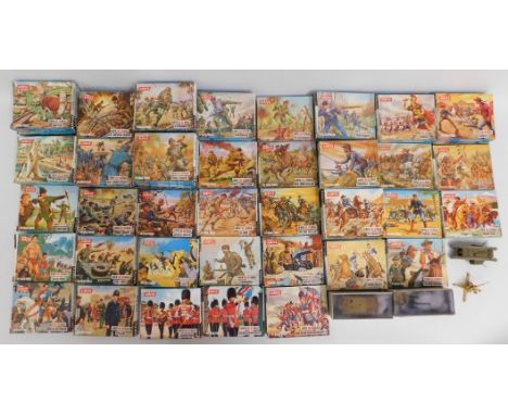 A quantity of fifty one boxed Airfix HO-OO scale model figures including soldiers of various armies, cowboys & Indians, farm/