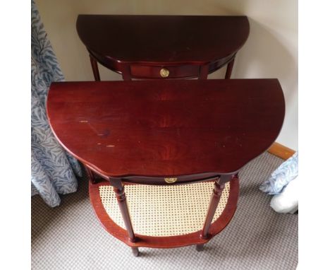 Miller's Cottage: A pair of D shaped hall tables with cane shelf under, 31in wide x 15.5in deep