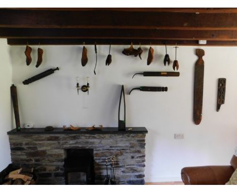 Cobbler's Cottage: A quantity of cobblers related items including tools & lasts, as shown on wall in image