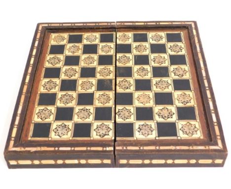 A decorative antique chess, draughts & backgammon board, 13.75in square