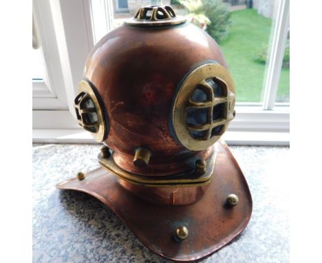 Mariner's Cottage: A copper & brass model of a divers helmet, 8in high