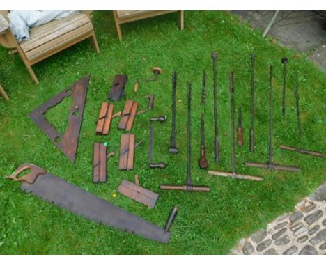 Carpenter's Cottage: A selection of antique carpenter's tools including walnut handled chisel, saw, a carpenter's plumb level